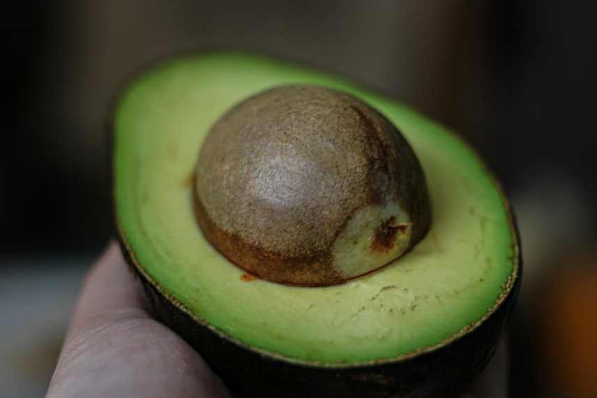 A close up of half an Avocado, complete with the stone, which make great Super Smoothies for Weight Loss. Avocado's that is.