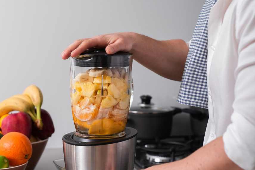 An image of mixed fruits in a blender highlighting what fruits should not be mixed in smoothies.