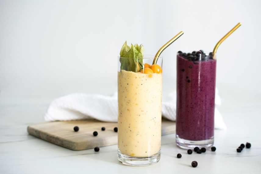 Two classes of Vegan Protein Smoothies, one coconut based the other is mixed berries, which contain all the essential vitamins and minerals for vegans.